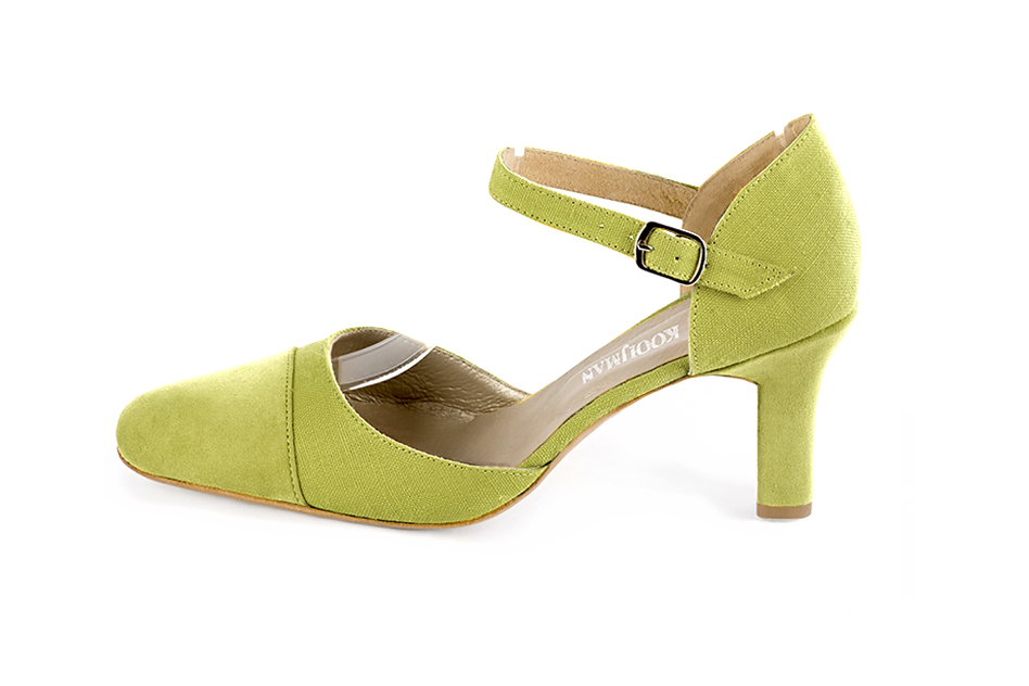 Women's pistachio green open side dress shoes, with an instep strap. Round toe. High kitten heels - Profile view